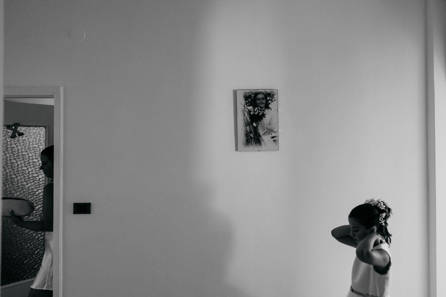 Artistic black and white composition showing interior shadows and minimalist decor.