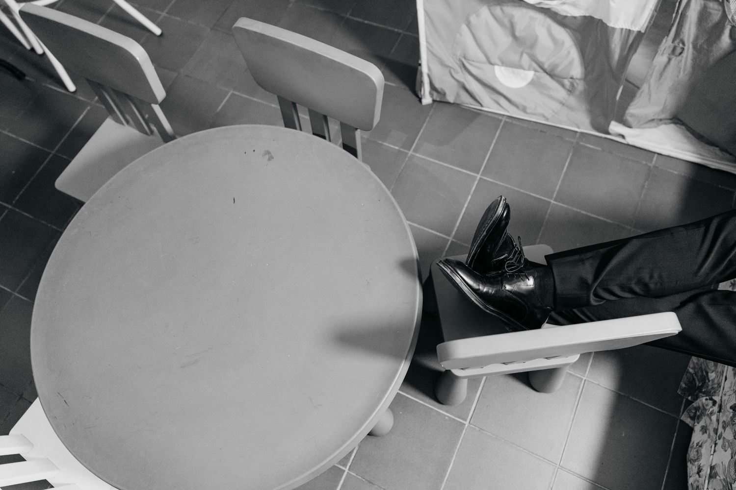 Black and white panoramic view of reception setup.