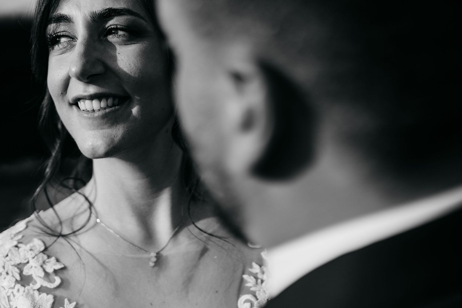 Black and white artistic portrait series showing intimate wedding moments.