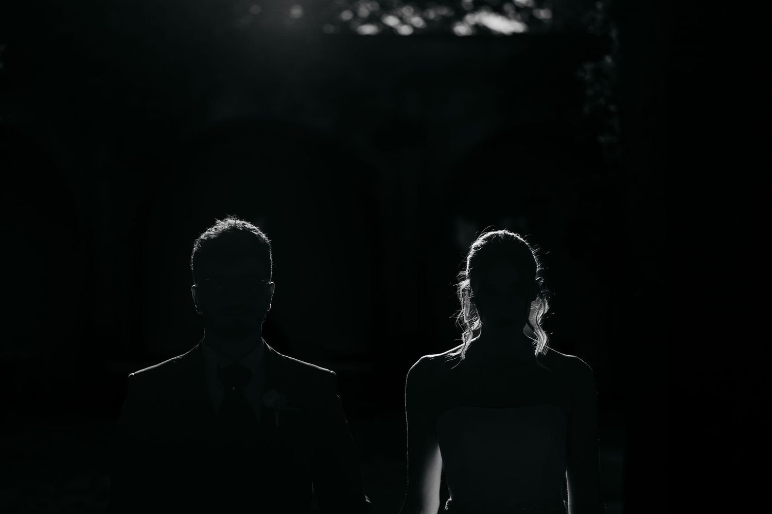 Artistic silhouette shots of dancing couples against a dark background.