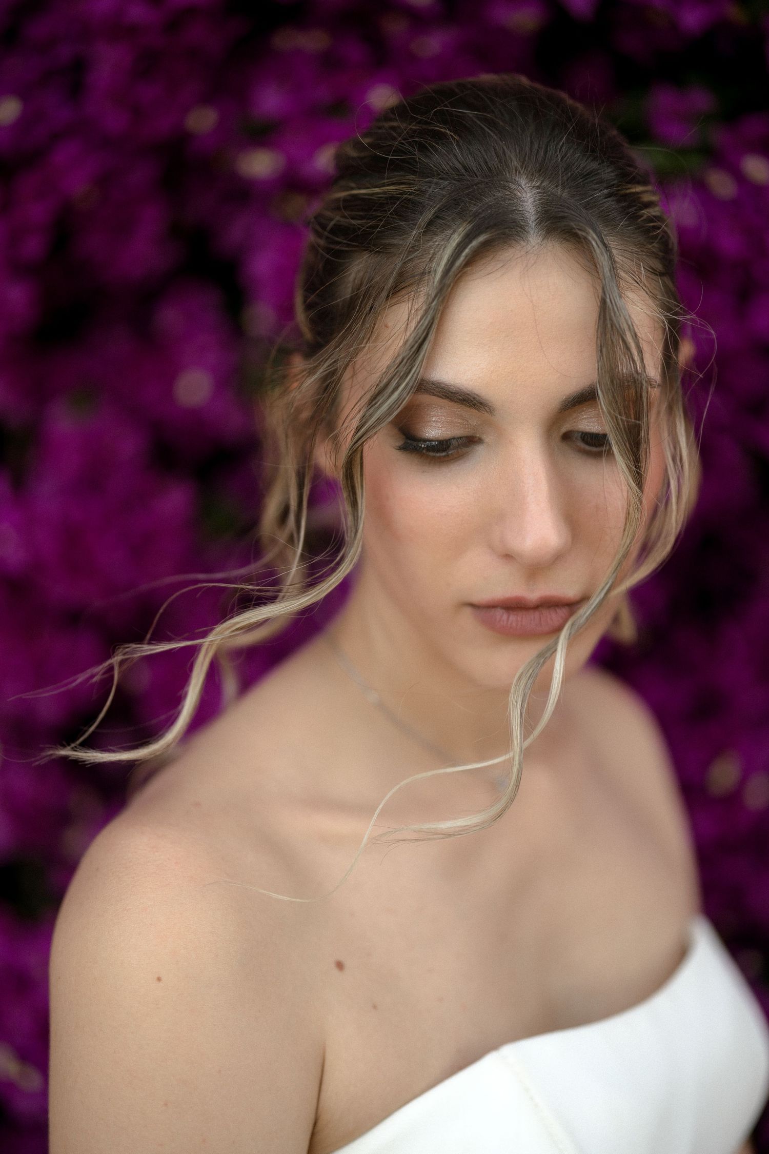 Close-up shots of white bridal gown details against a vibrant purple floral background.