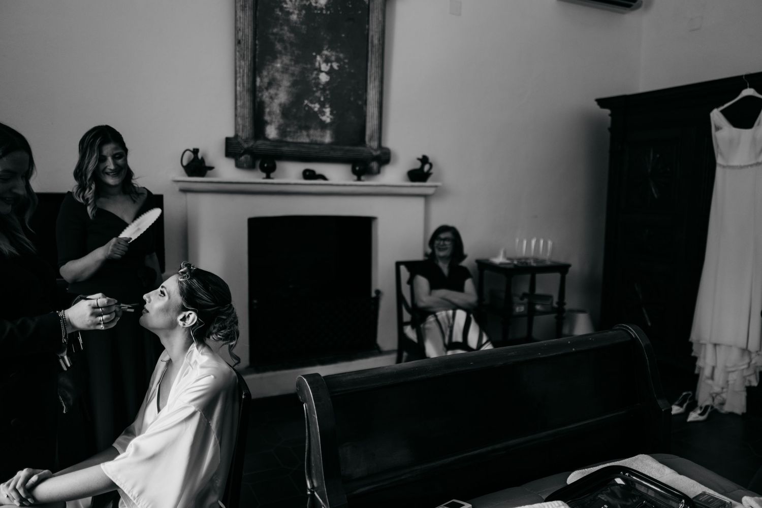Black and white photo series showing dramatic movement and dance poses in an interior space.