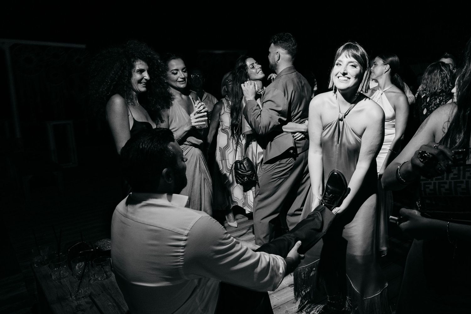 Black and white photos of wedding reception dance party.