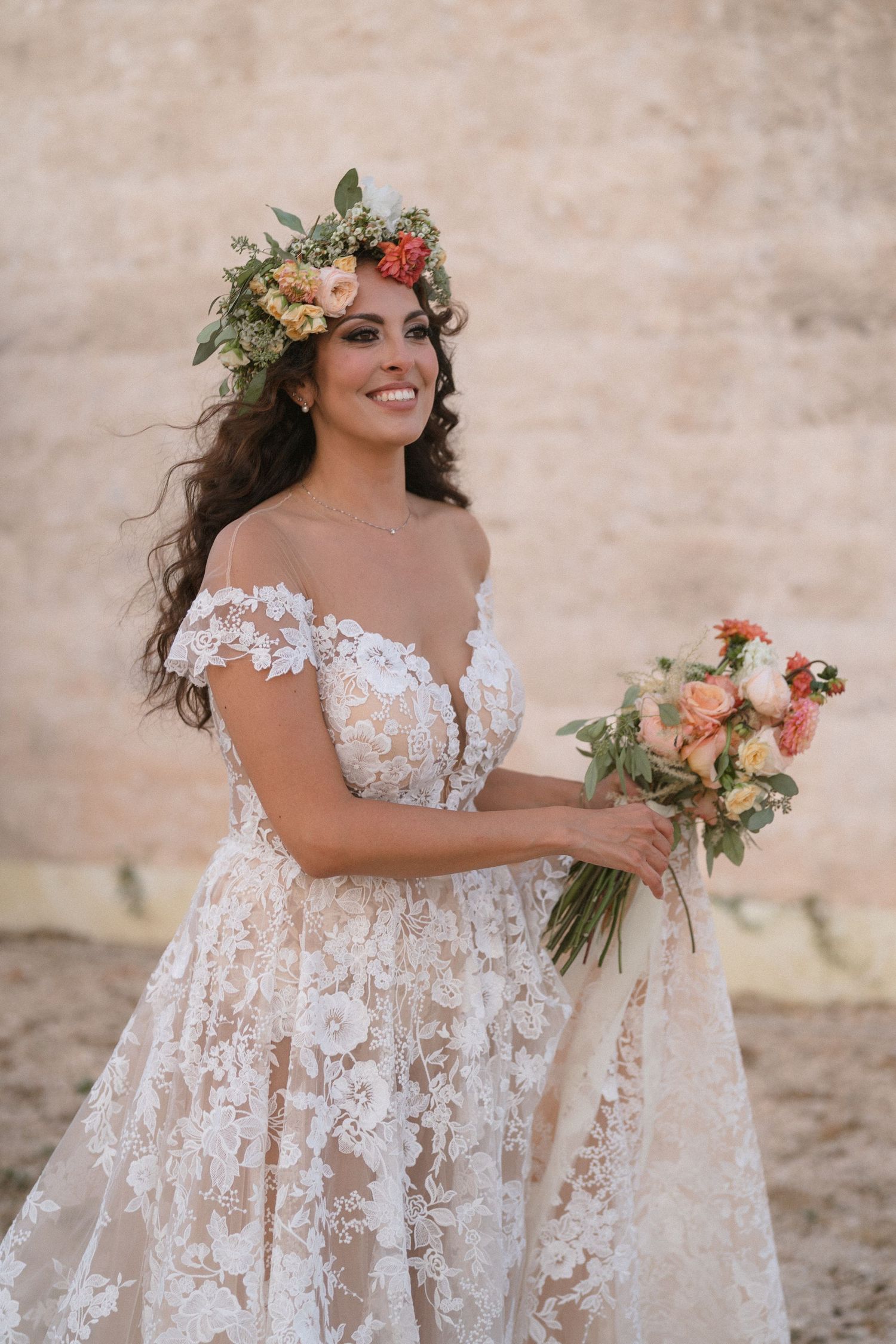 Ethereal bridal portraits featuring delicate lace dress and floral bouquet.