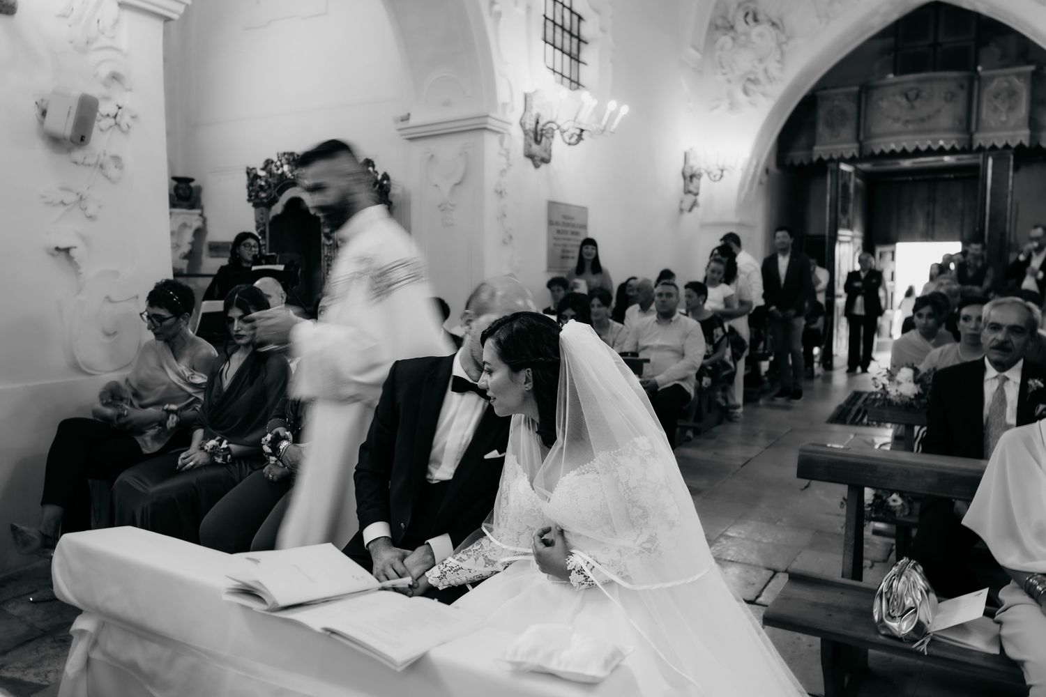Series of candid wedding reception moments captured in black and white photography.