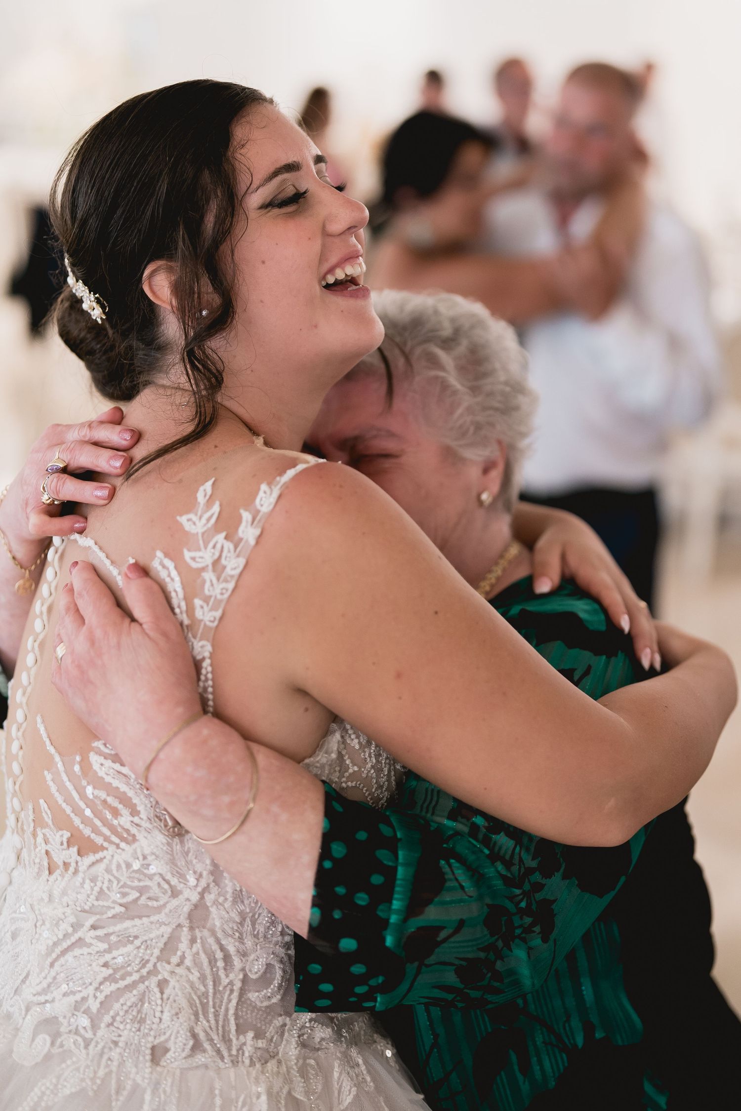 A joyful dance moment captured during a wedding reception.