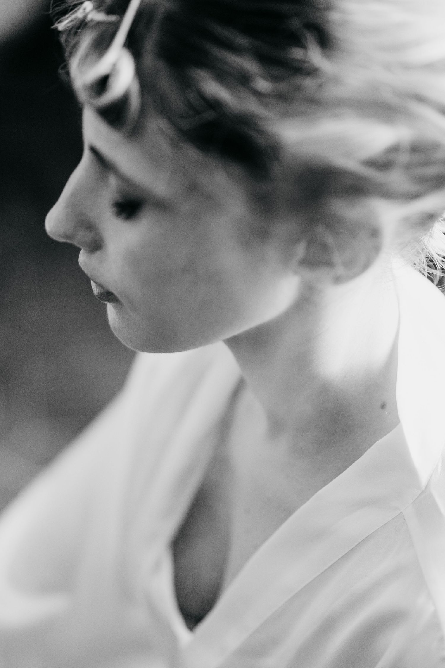 Black and white artistic portrait series showing profile views with soft focus and ethereal lighting effects.