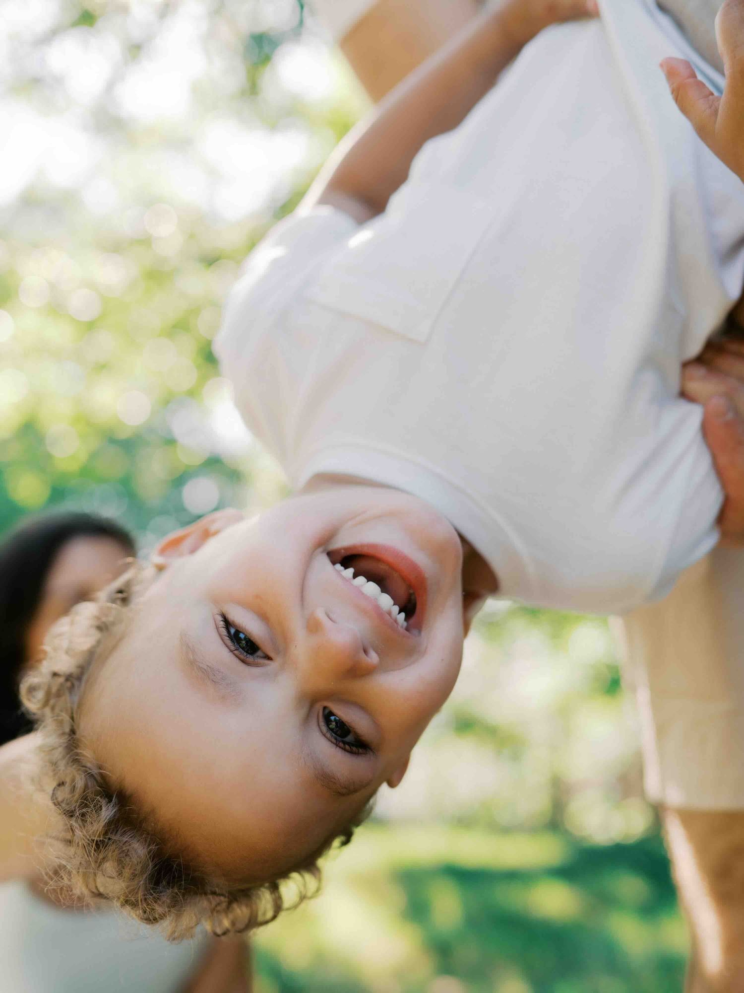 Candid family portrait captured by a Mobile, Alabama family photographer.