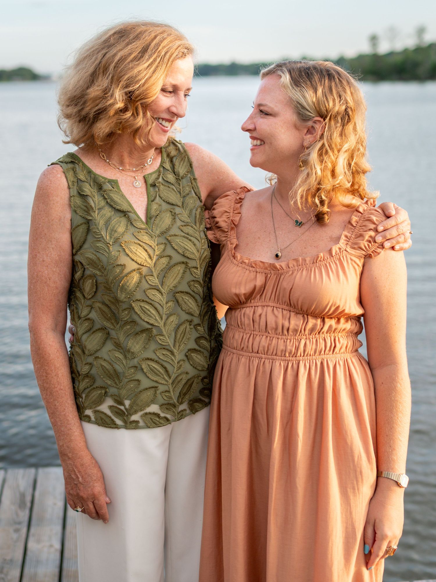 Mom and daughter hugging and smiling during Mobile Alabama Extended family sessions