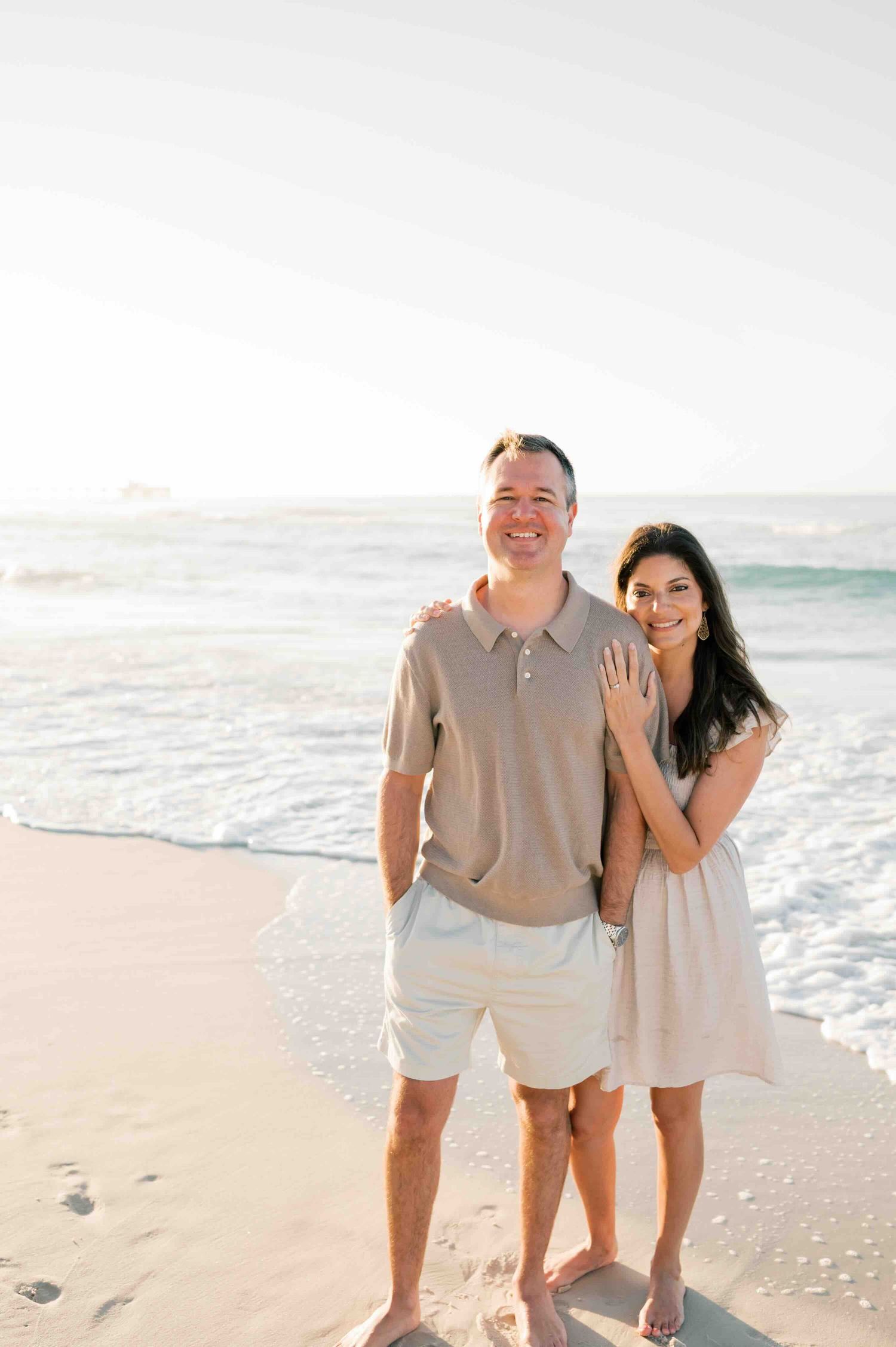 Gulf Coast extended family photography session on Dauphin Island with candid moments on the beach