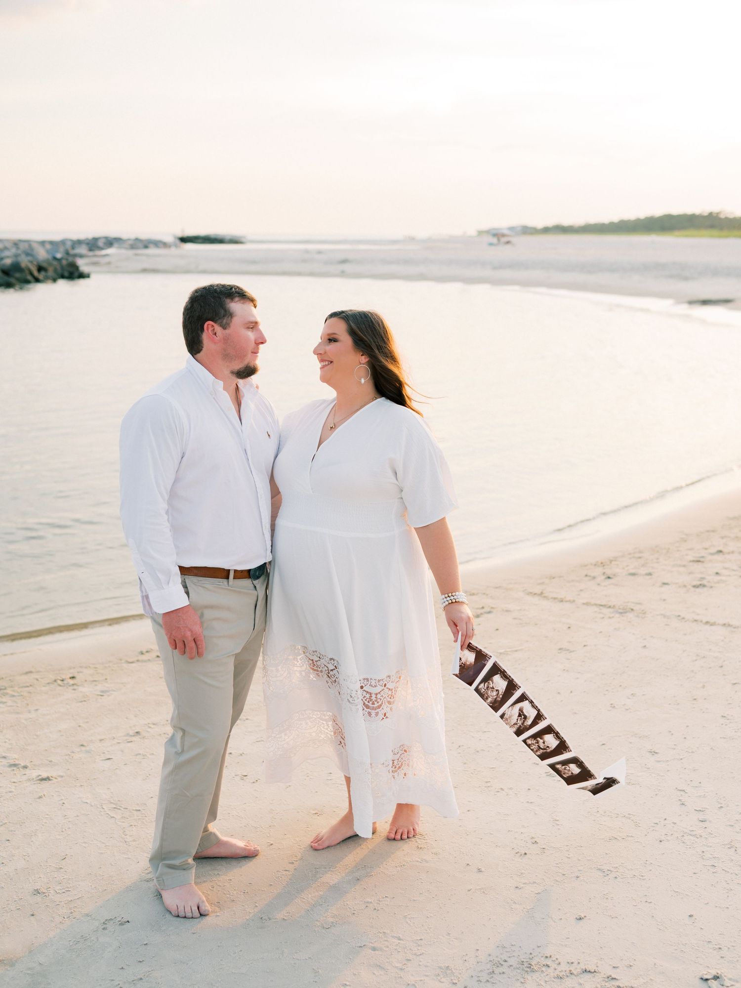 Maternity family photography session at dauphin island during golden hour