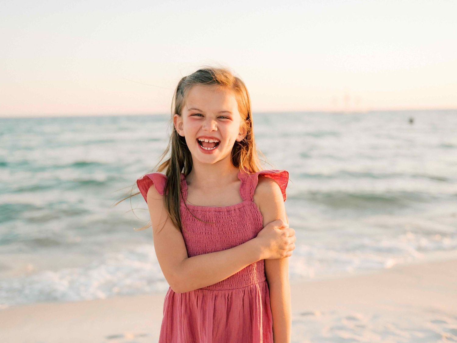 Girl laughing during outdoor family session in Mobile Alabama