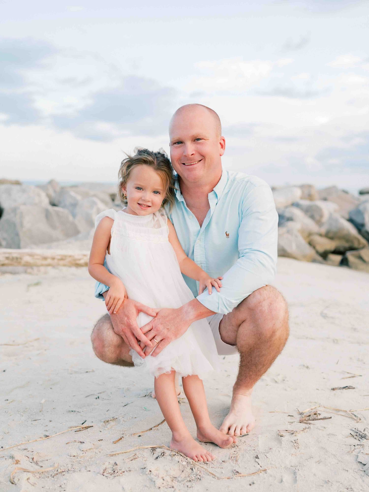 Gulf Coast family photography session on Dauphin Island with son and daughter posing on the beach
