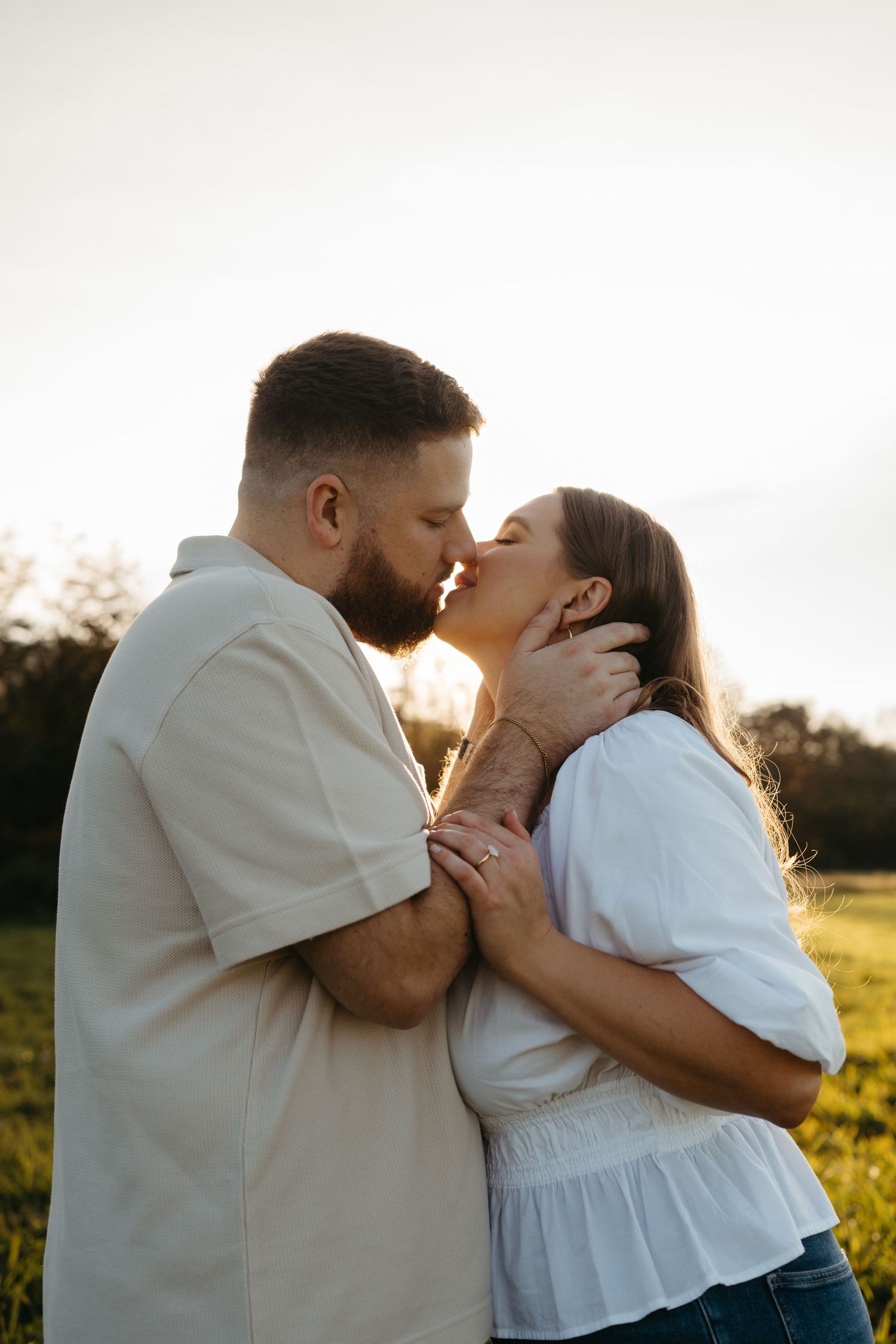 An intimate couples portrait session in warm sunset lighting.