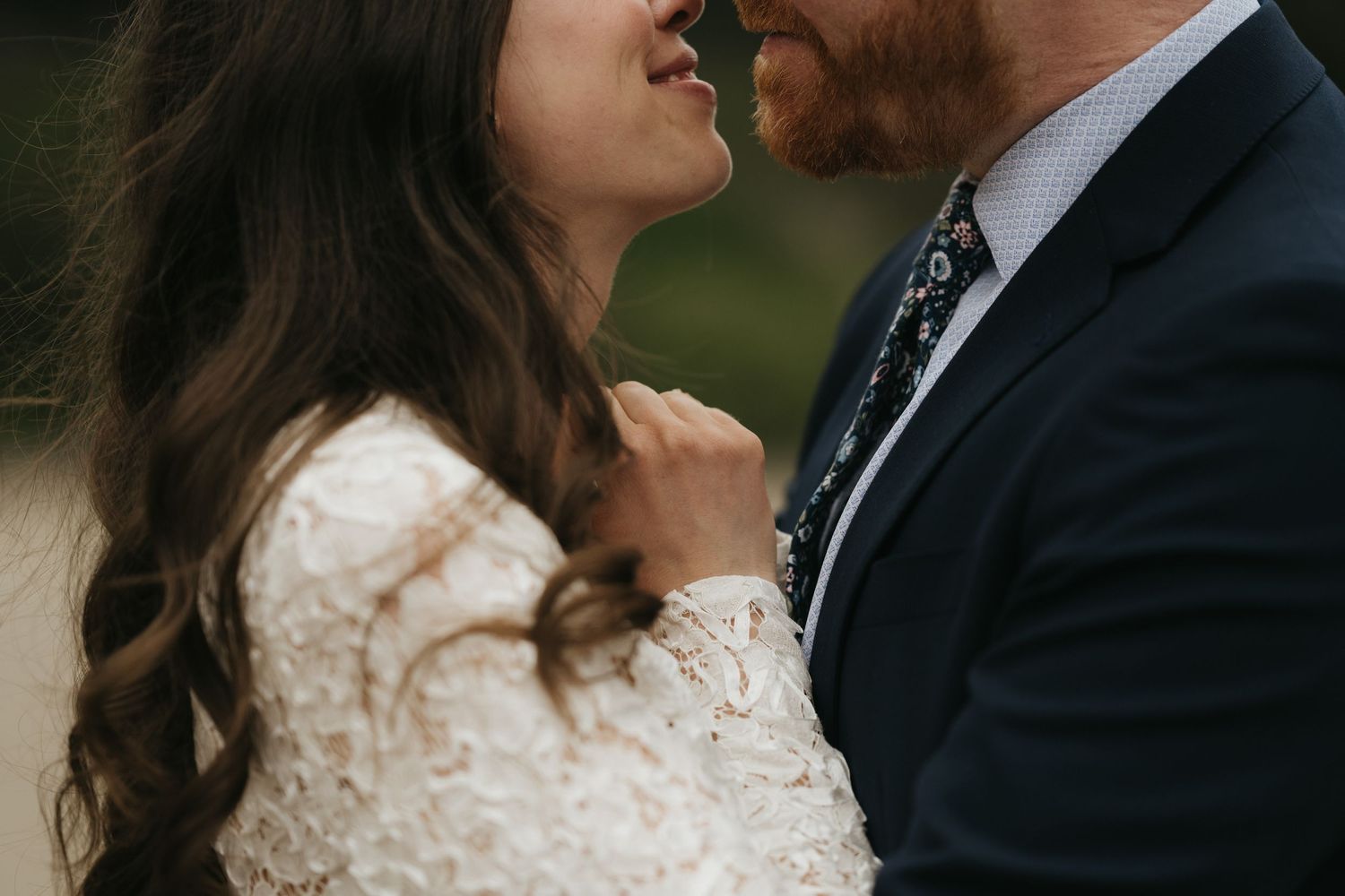 Intimate close-up of a tender moment between newlyweds.