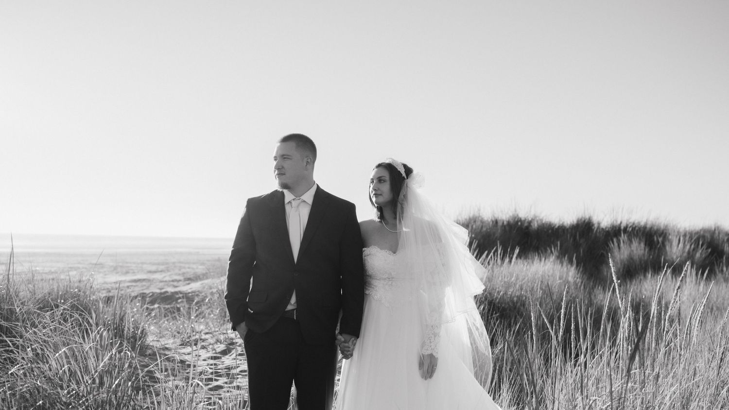 A minimalist wedding photo series showing silhouettes against a bright sky.