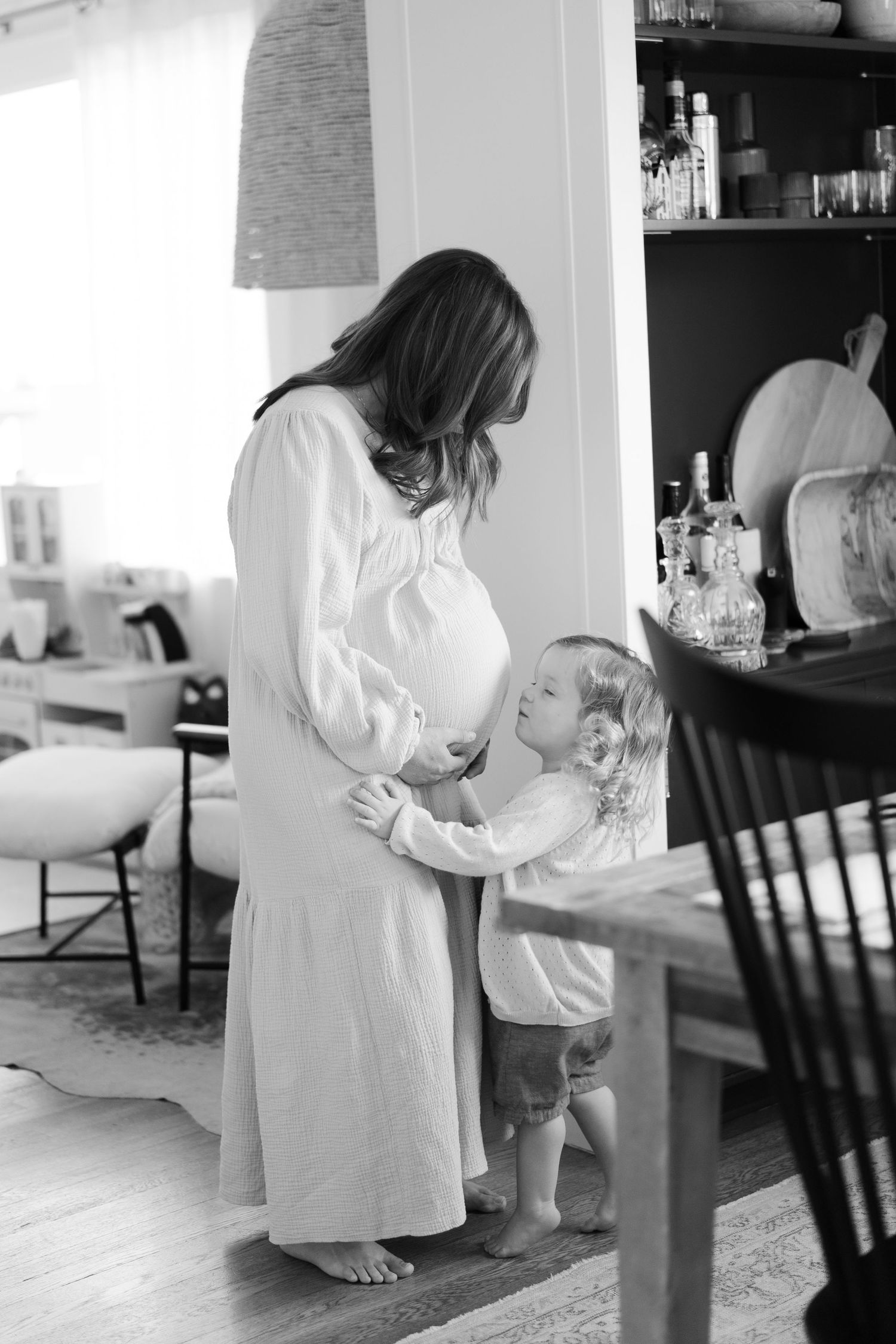 Black and white candid shots of morning moments at home.