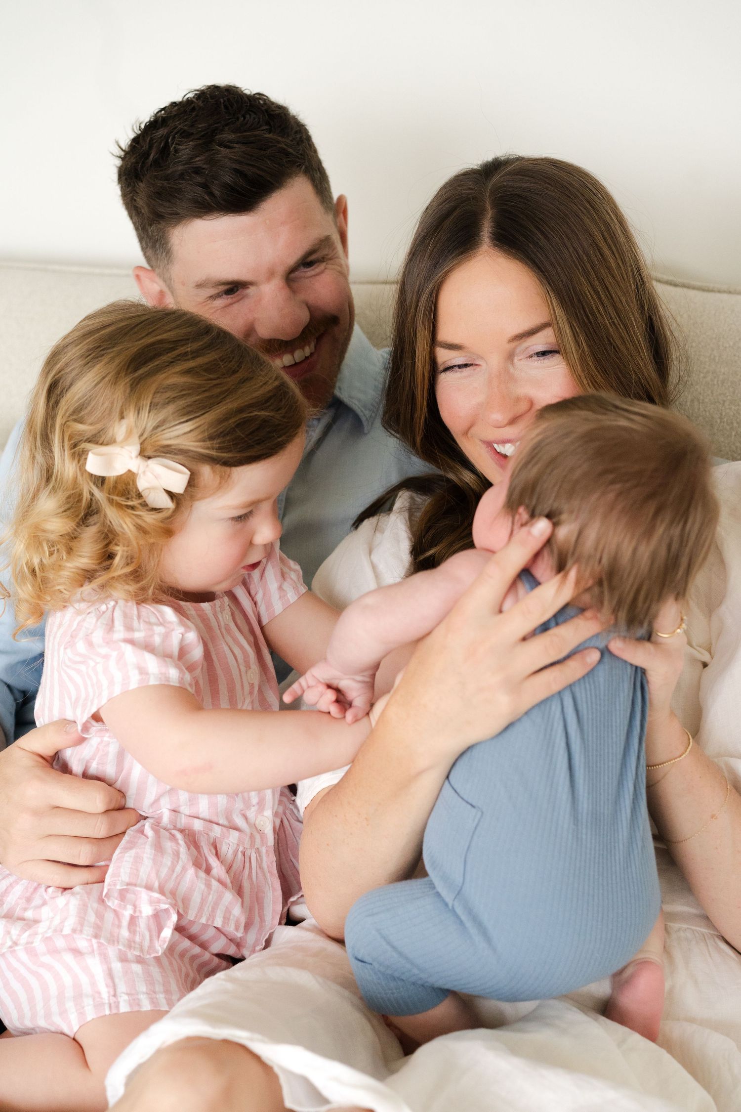 Natural lifestyle photo of family sharing loving moments together.