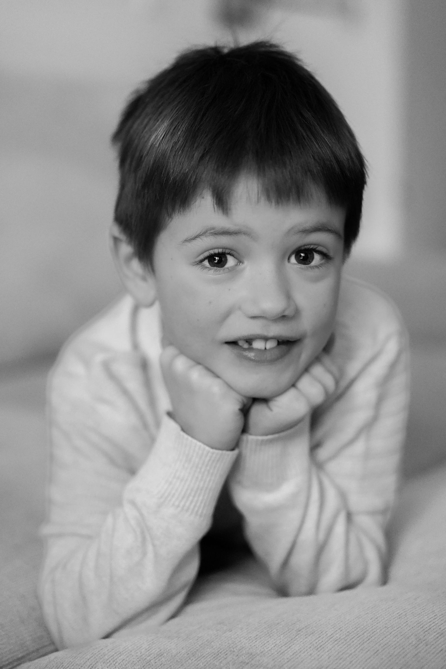 Black and white portrait series showing sweet expressions and smiles.