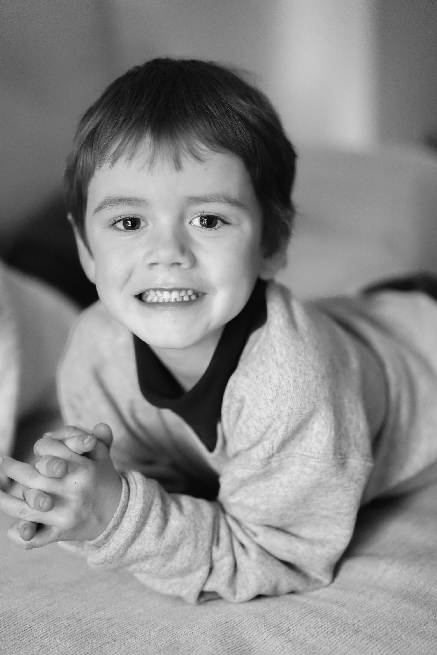 Black and white portrait series capturing natural candid moments.