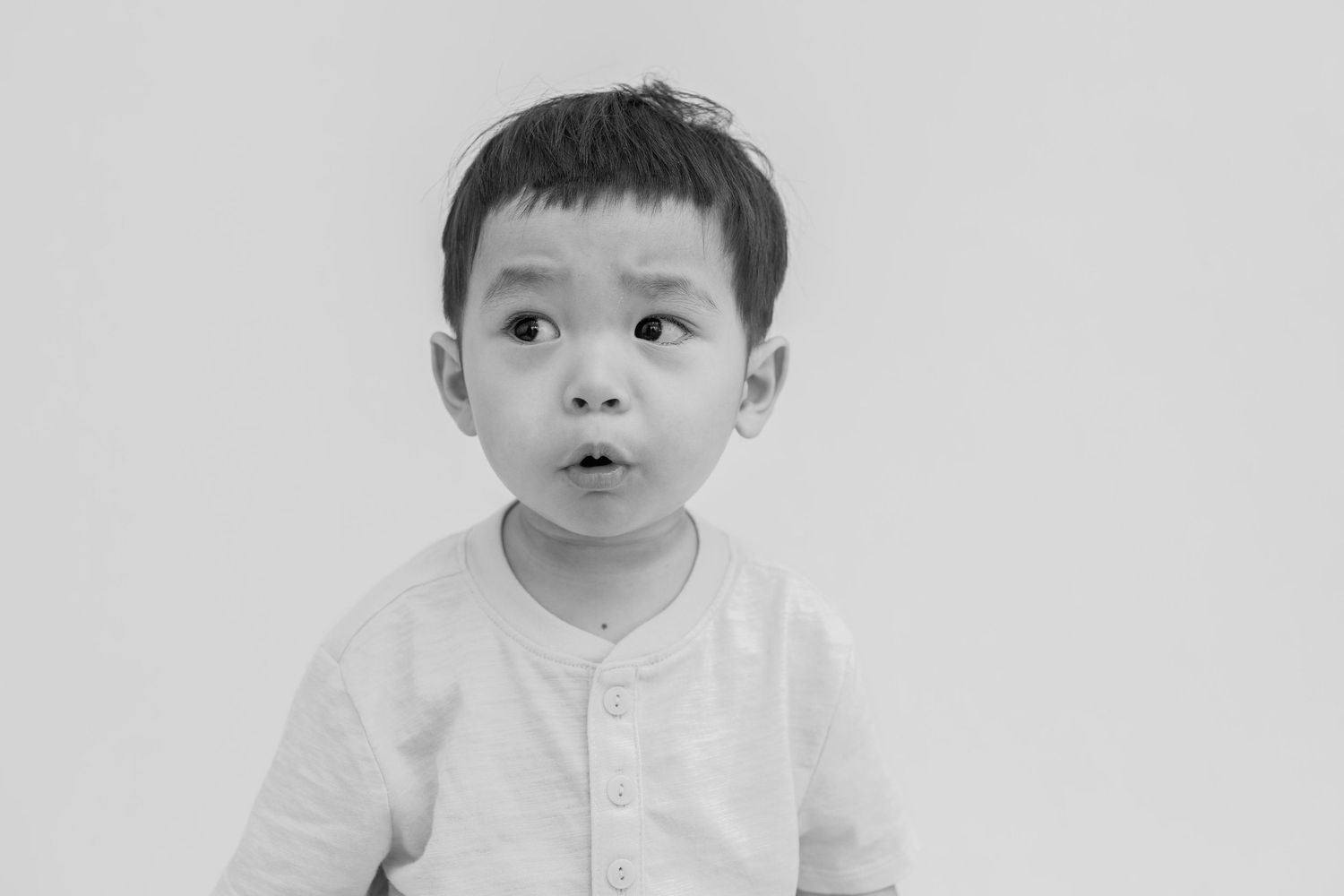 Candid school portrait of young child, indoor natural light, Orange County photographer