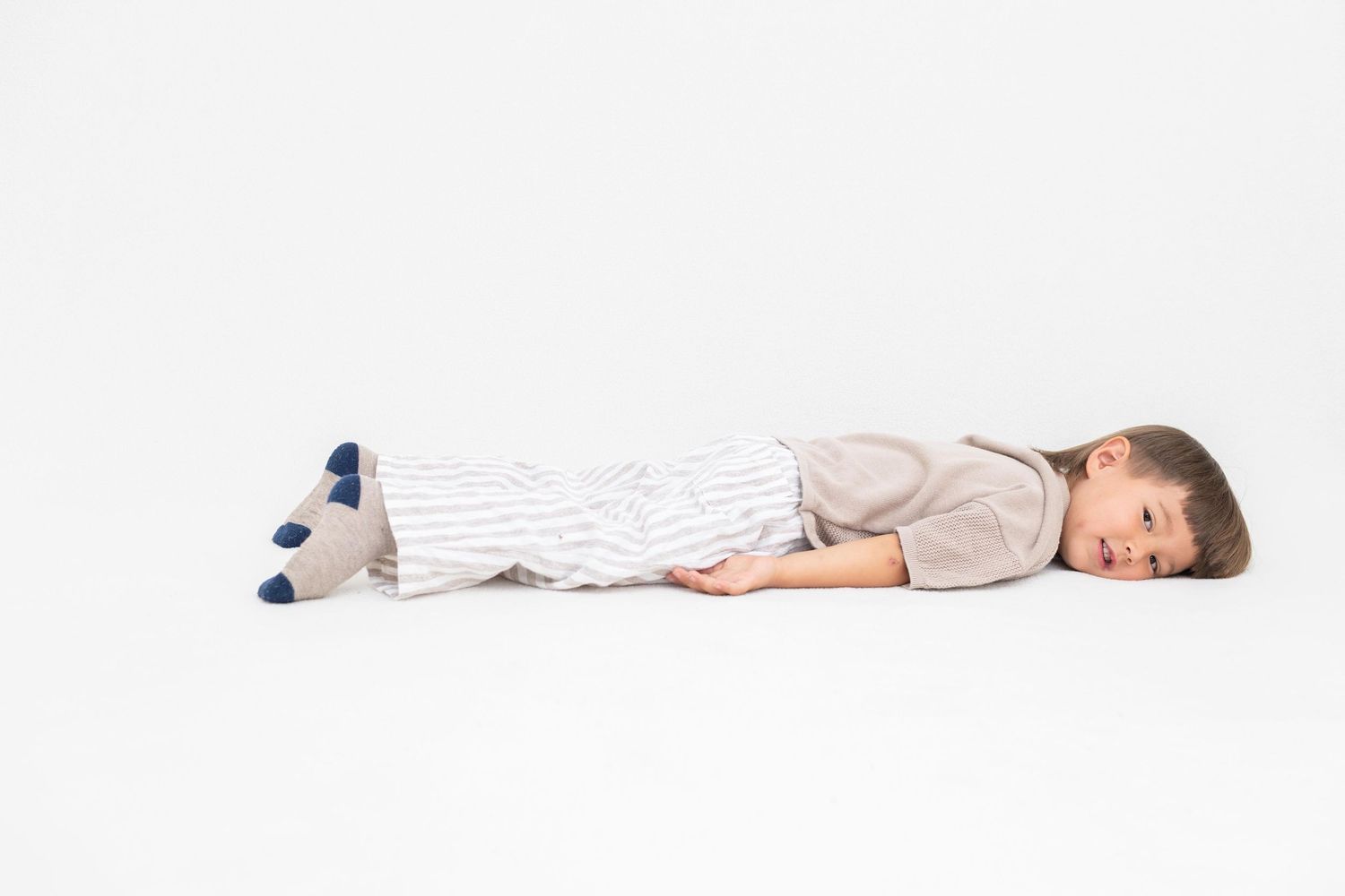 Candid school portrait of young child, indoor natural light, Orange County photographer