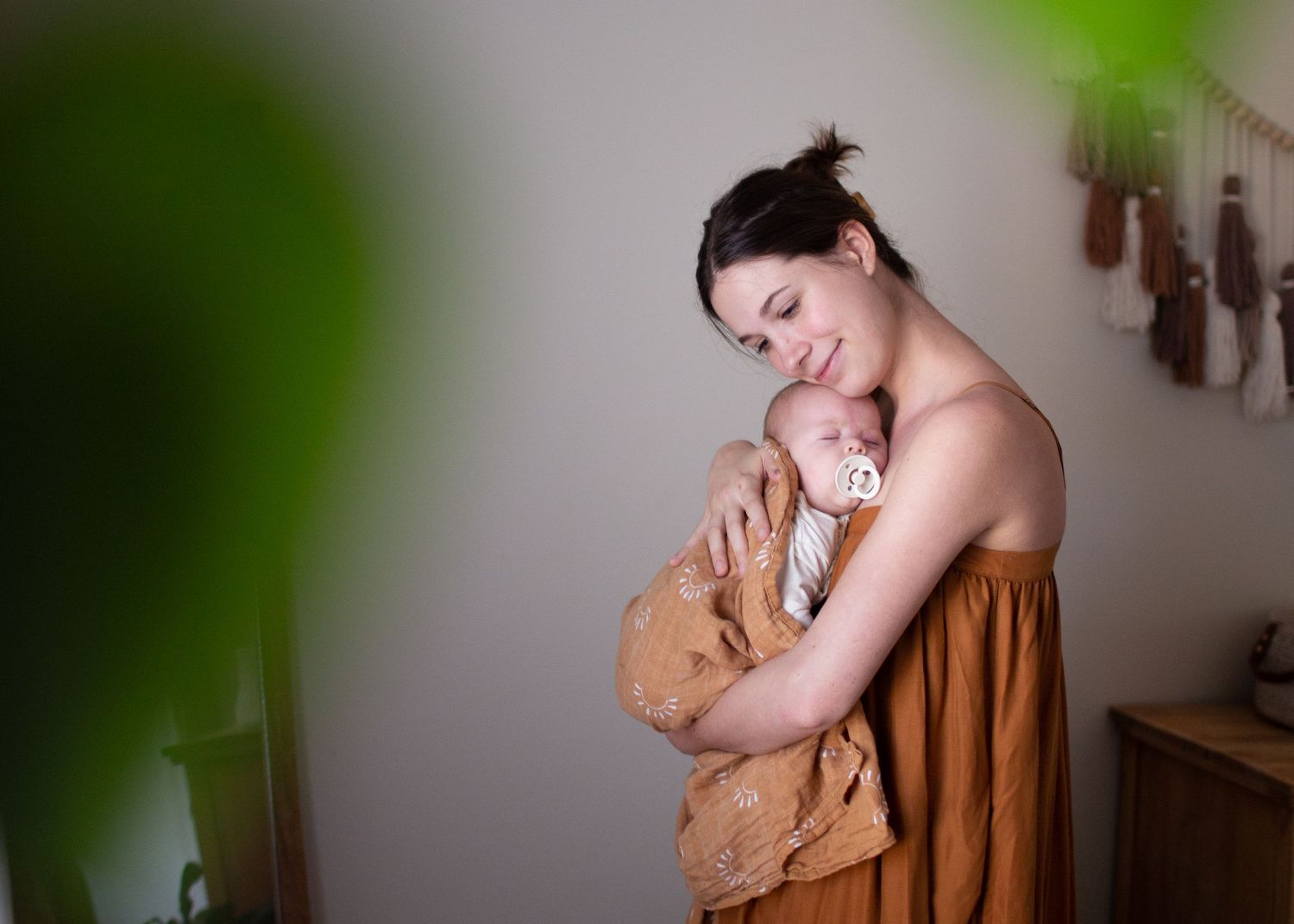 Mother and toddler sharing a quiet moment during indoor family lifestyle session