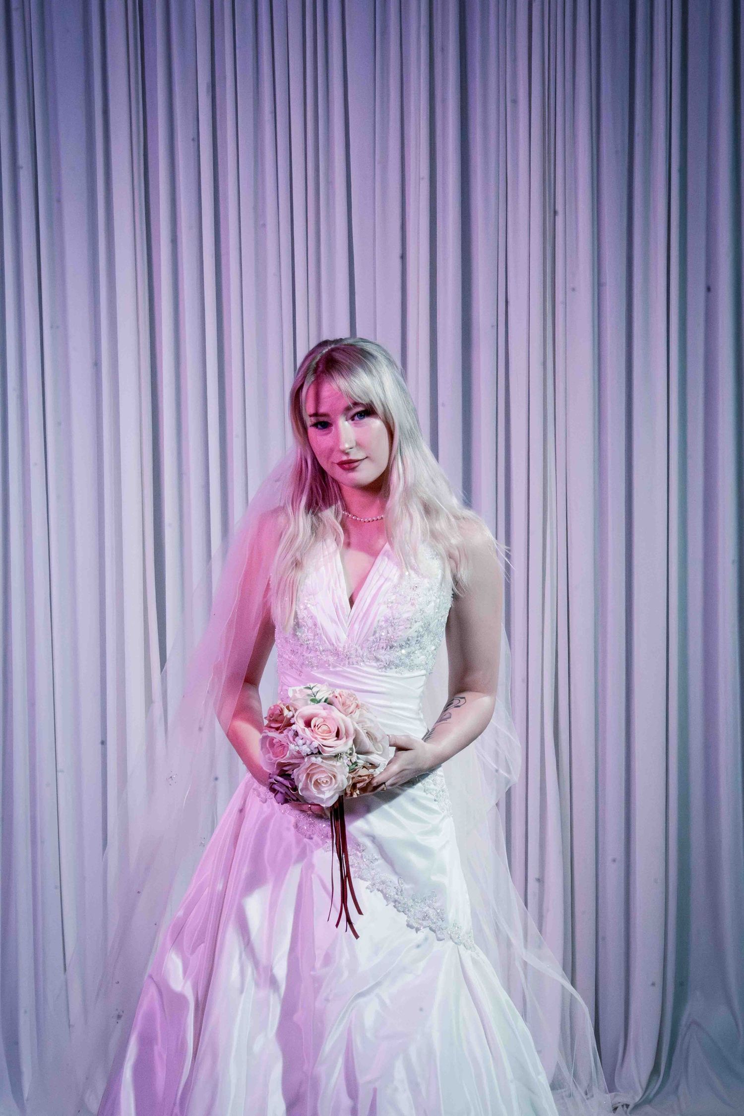 A series of bridal portraits showing a woman in a white wedding dress holding a pink bouquet against a purple-lit backdrop.