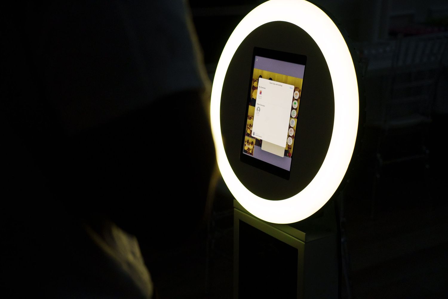 Series of wall-mounted digital displays with circular LED lighting rings.