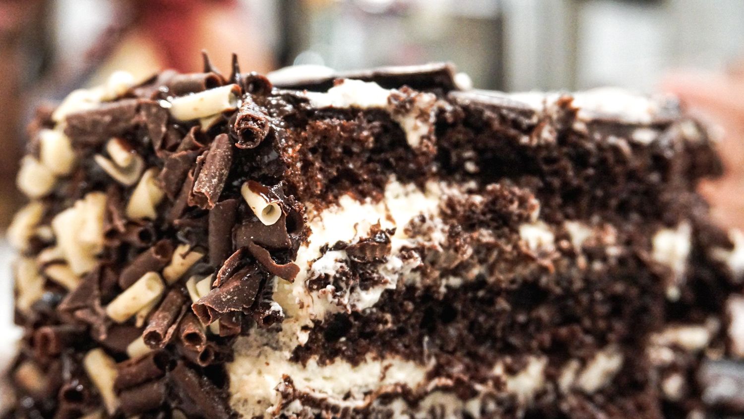 Close-up of chocolate crumble dessert topping with dark rich texture.