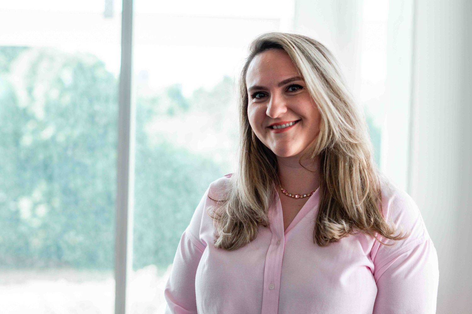 Casual business portraits in bright modern office space.