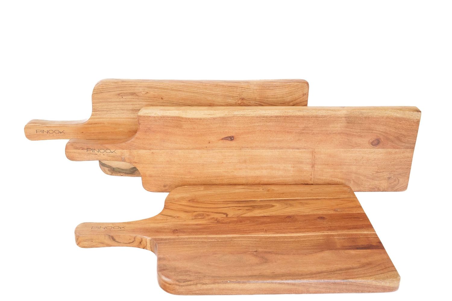 Set of four natural acacia wood cutting boards with handles, varying in size, displayed on a white background.
