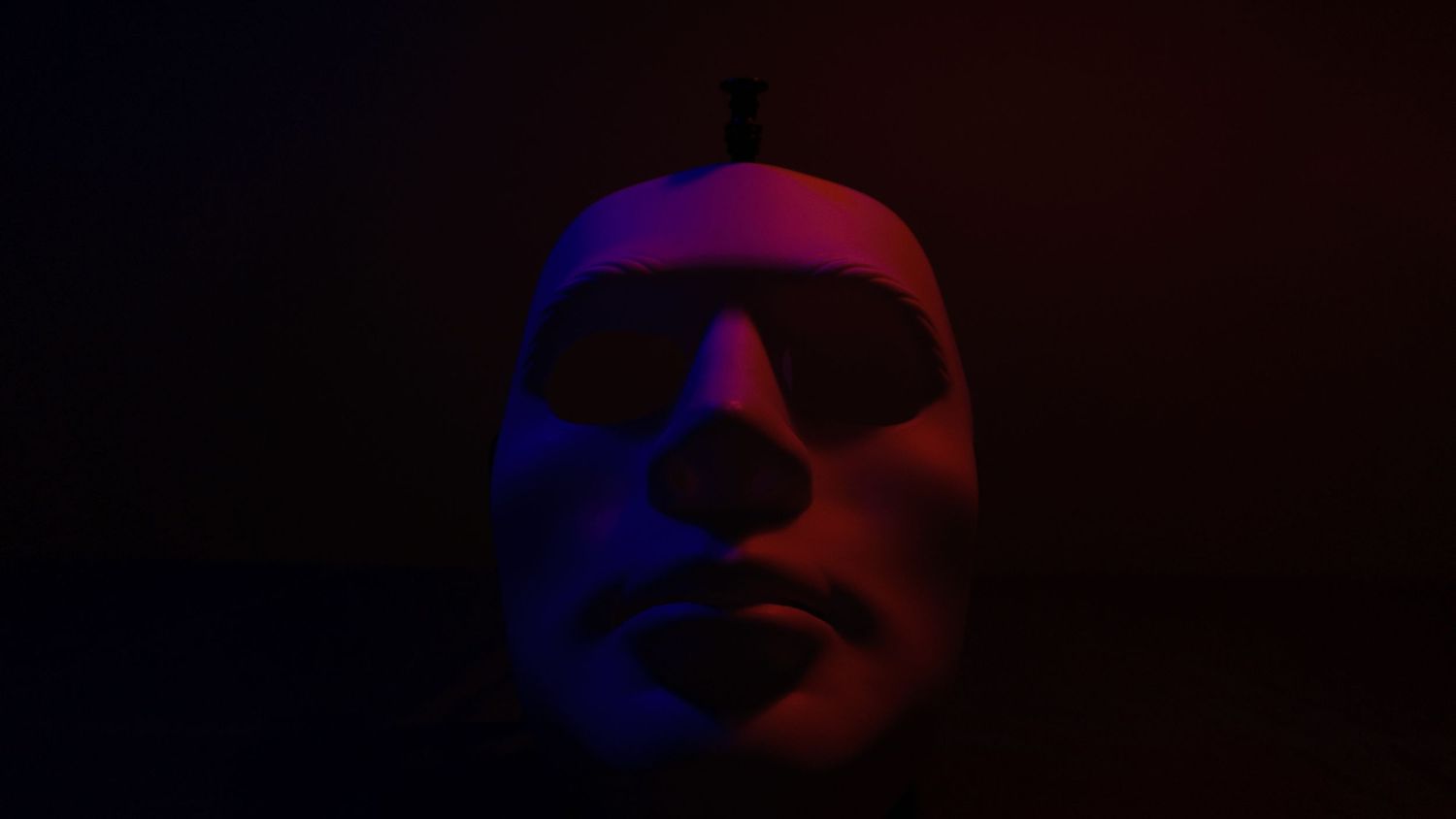 Abstract circular patterns in red and blue lighting against dark background.