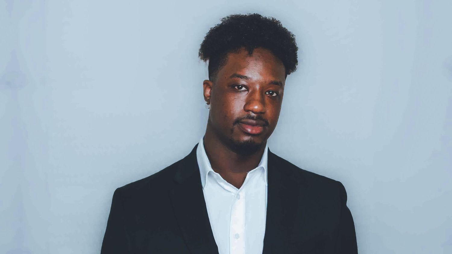 Series of professional headshots with clean background and formal attire.