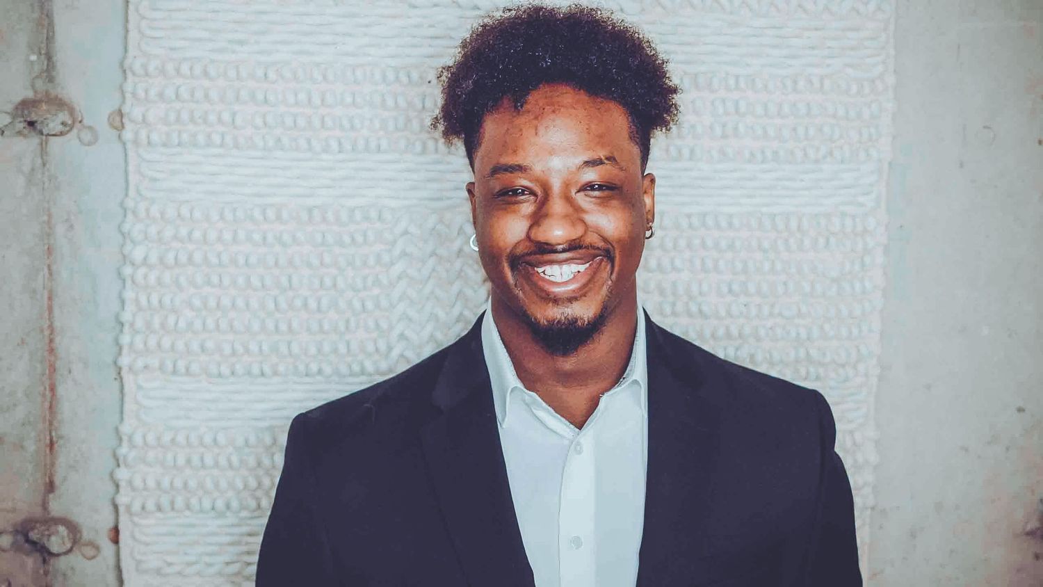 Professional headshots showing joyful expressions in business attire.