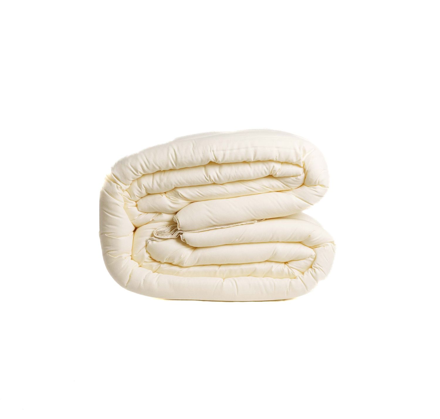 Folded cream-colored comforter with quilted stitching, soft plush fill, ideal for cozy bedding.