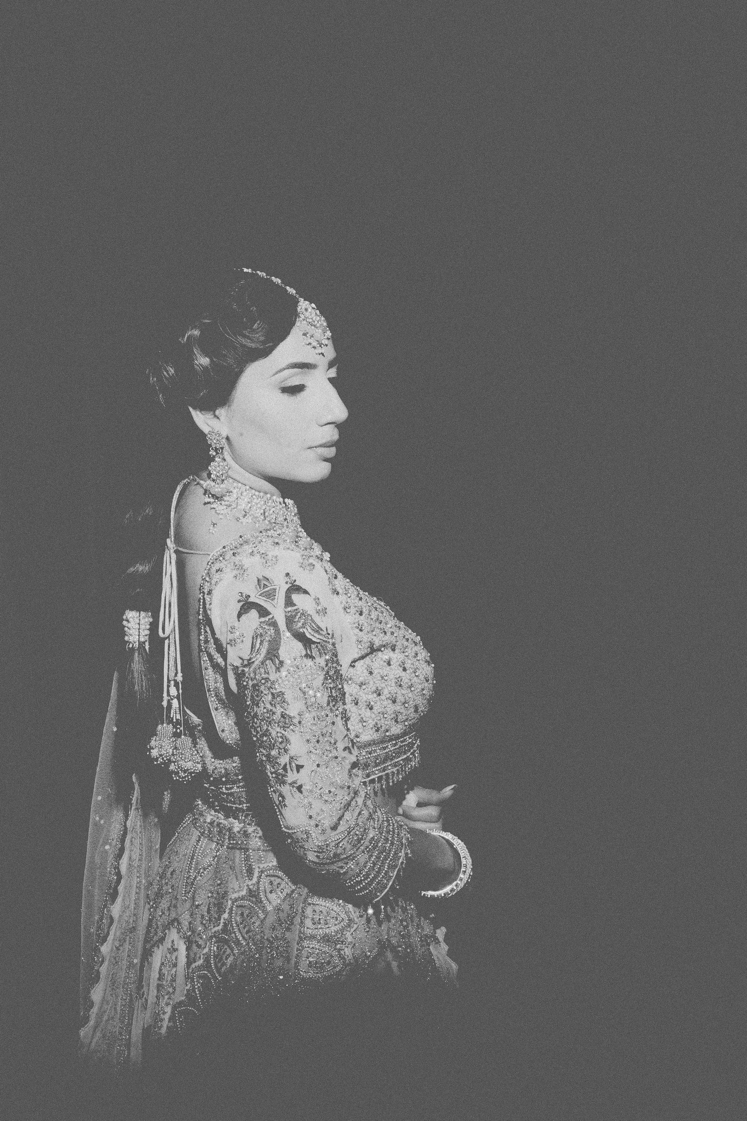 Black and white portrait series showing traditional Asian woman in embroidered clothing with ornate headdress.