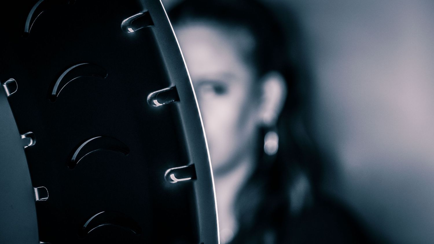 Close-up detail shots of camera equipment in low light conditions.