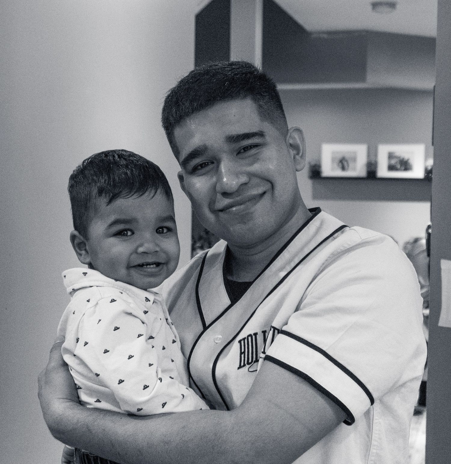 Black and white candid moments showing affection and joy.
