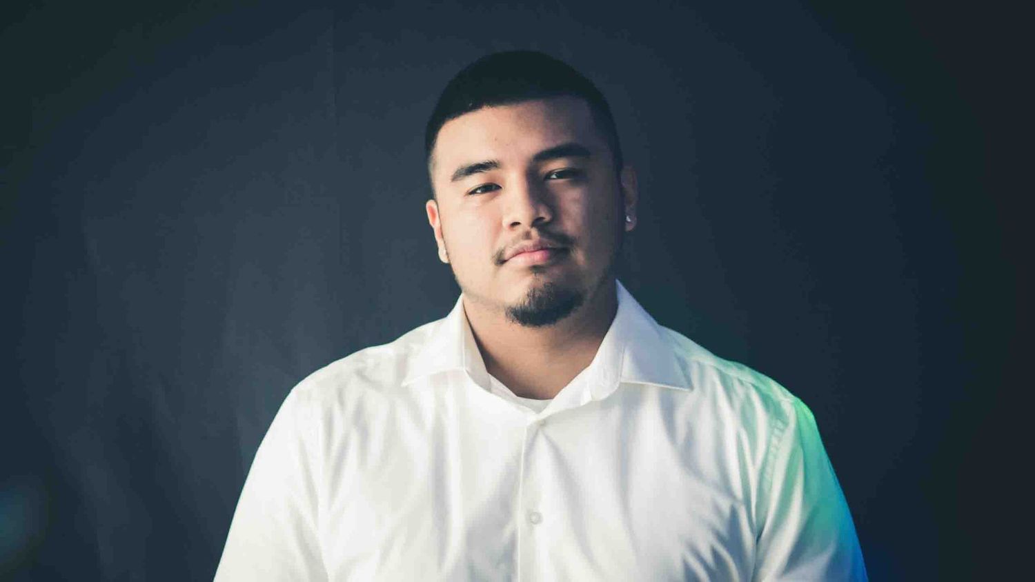 Series of studio portraits with clean white shirt styling.