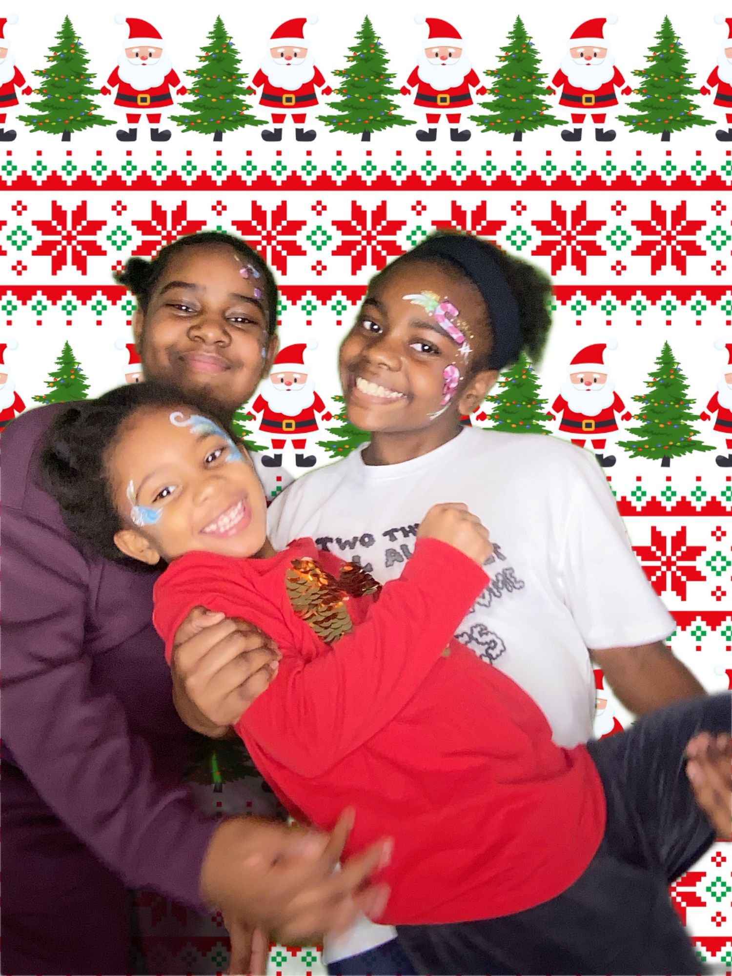 A playful holiday photo against a festive Santa and tree patterned background.