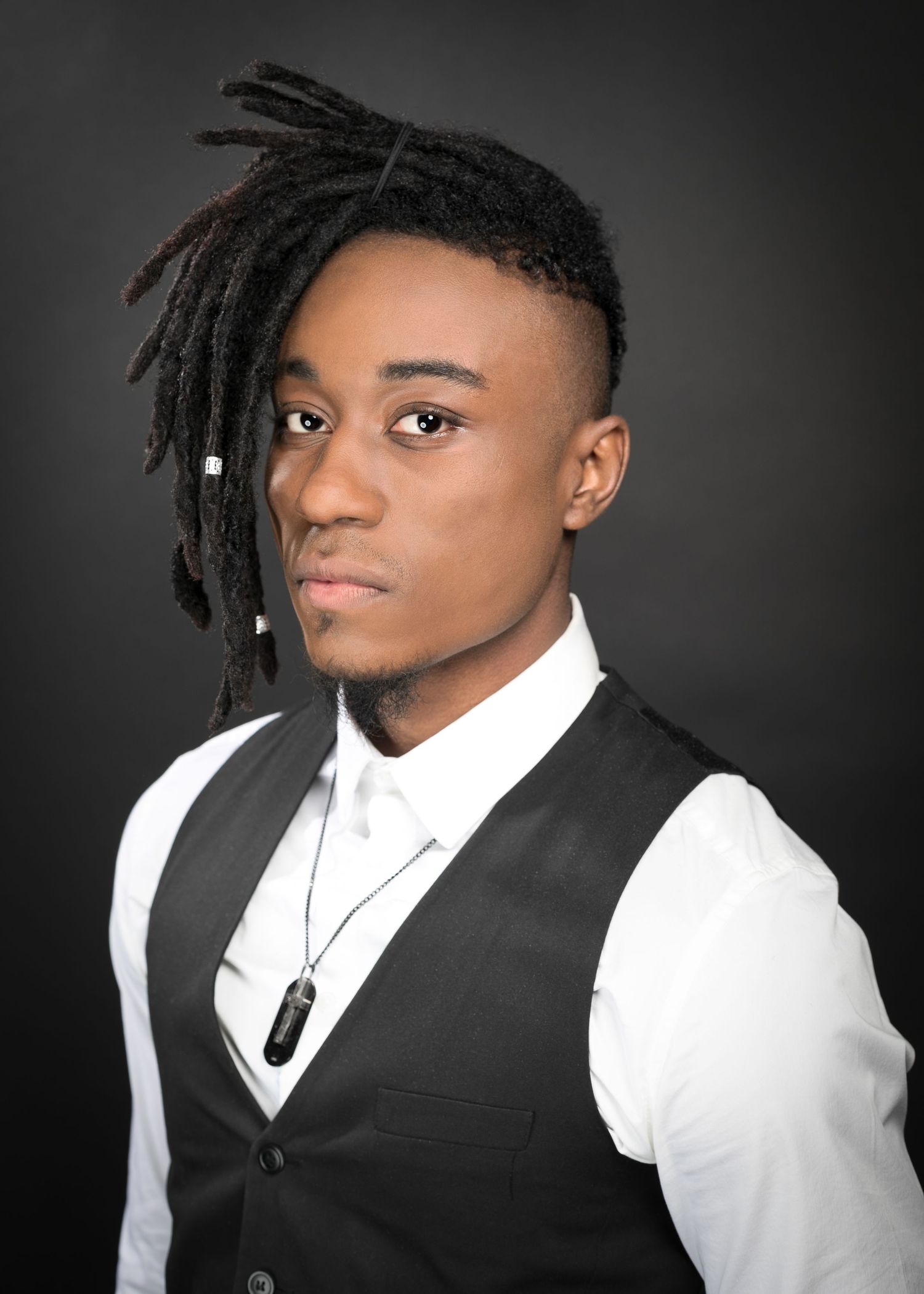 Young man with dreadlocks