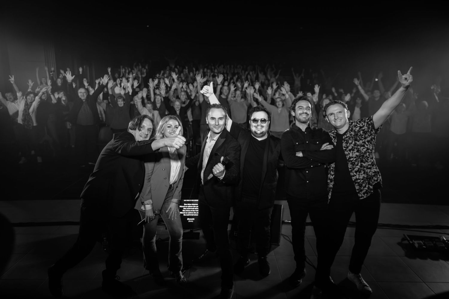 Photo de groupe en concert