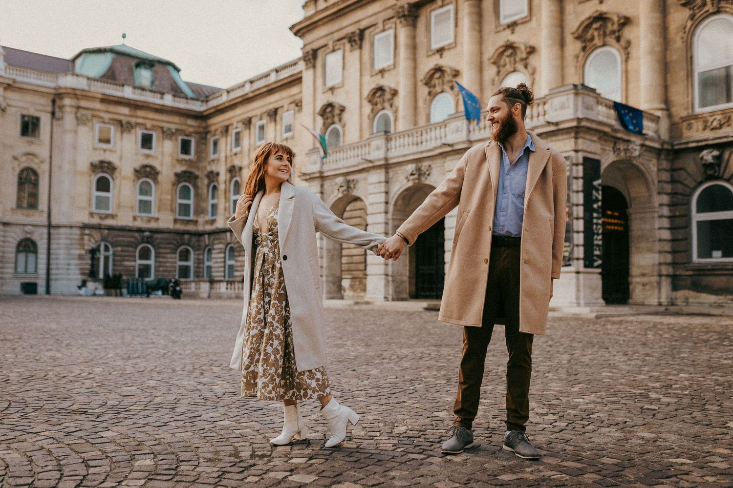 Stylish couple posing for their professional photo shoot at Buda Castle