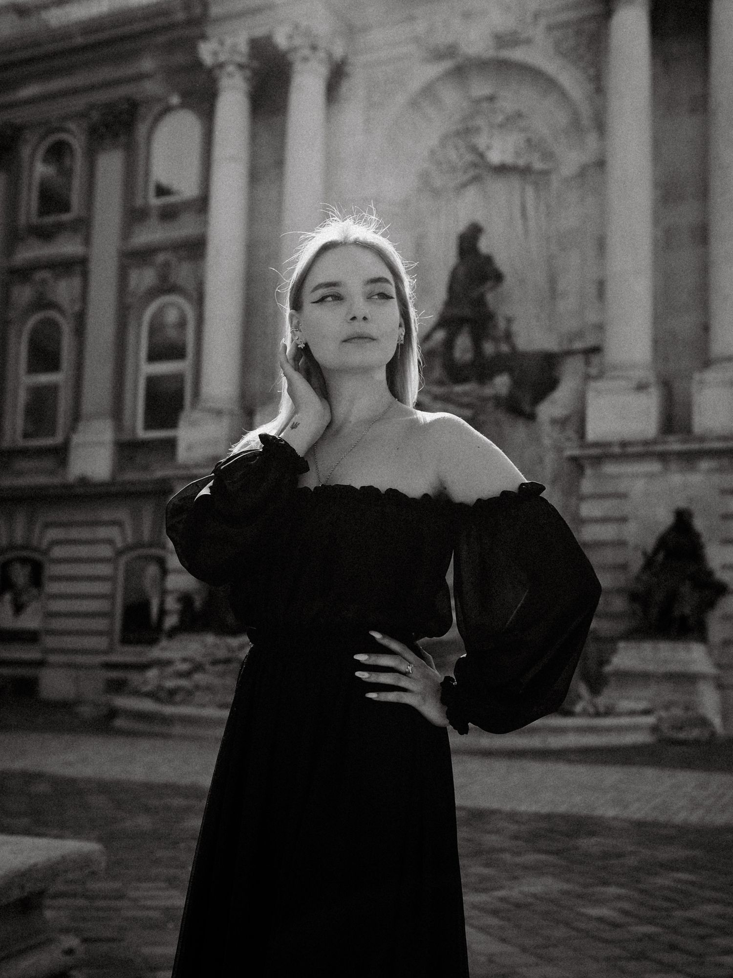portrait of a young woman posing for a photo shoot at Buda Castle