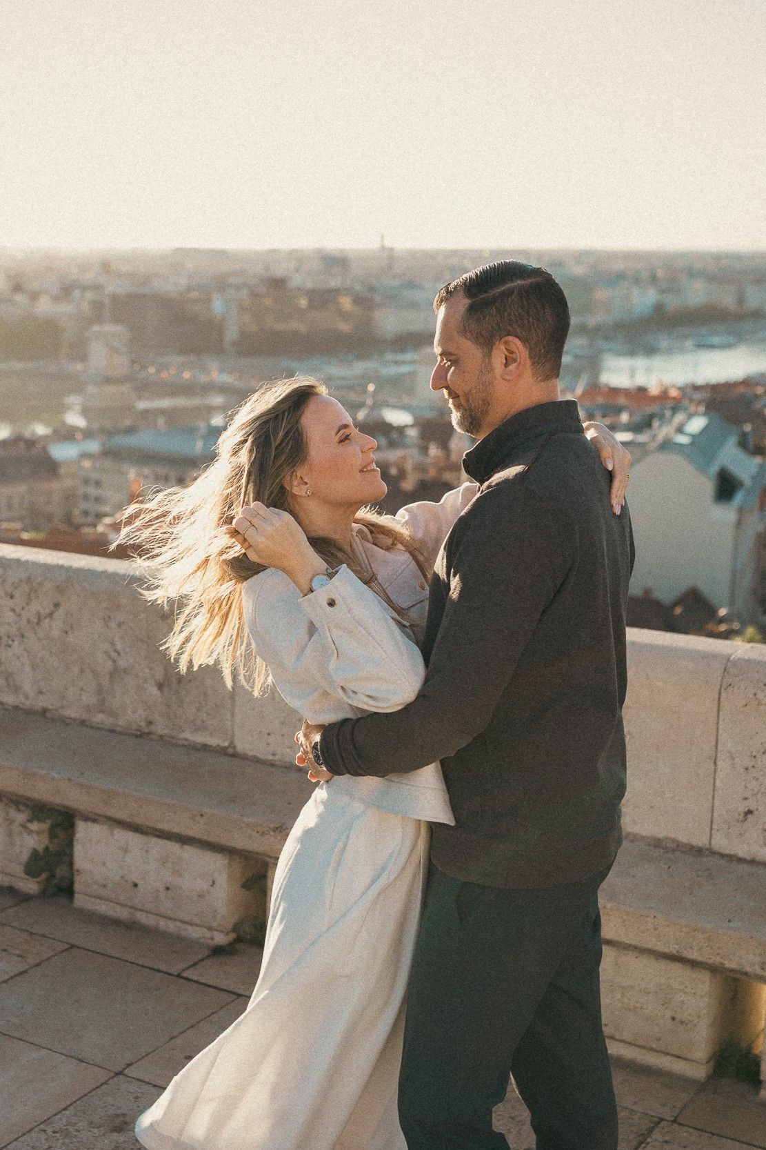 Portrait of a couple taken early in the morning in Budapest by photographer András Grausz