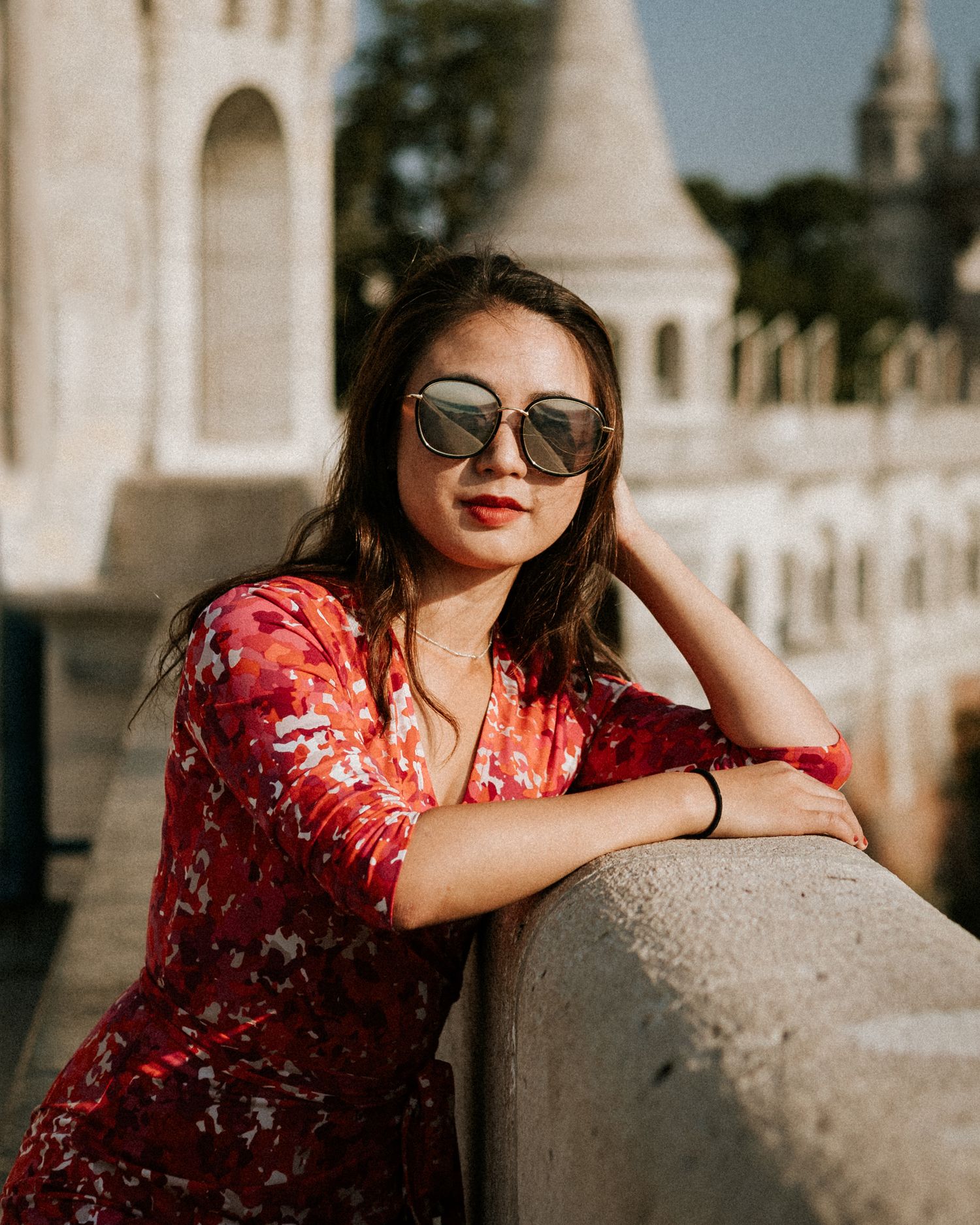 Young woman in summer dress, looking in the camera
