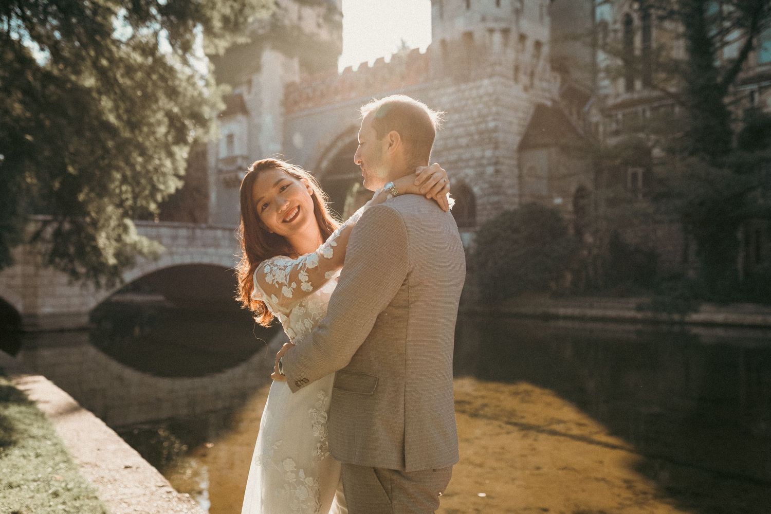 Pre-wedding photo shoot of an international couple on a sunny morning at Vajdahunyad Castle in Budapest