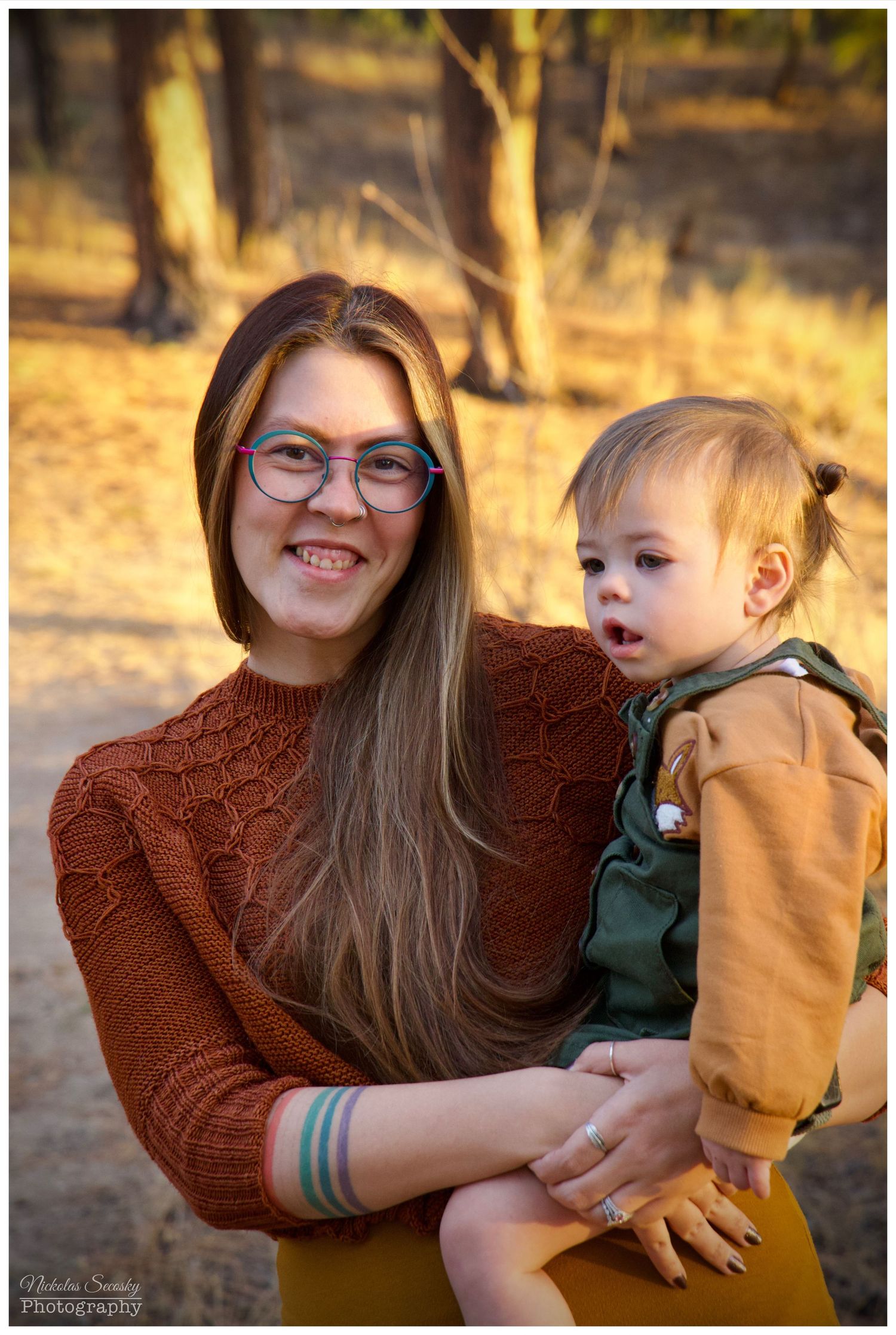 A mother and daughter posing for the camera
