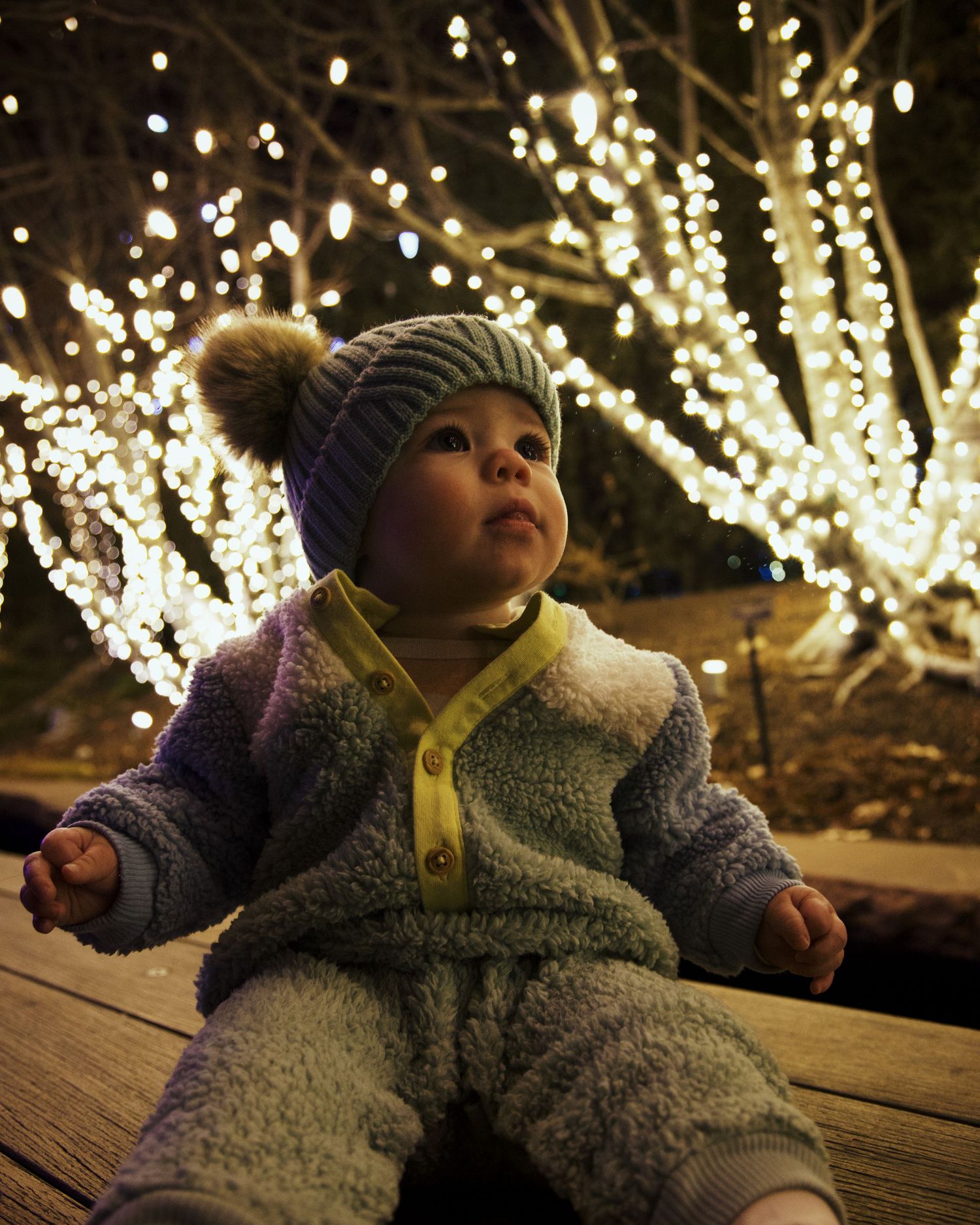 Small Baby looking at chrismas lights